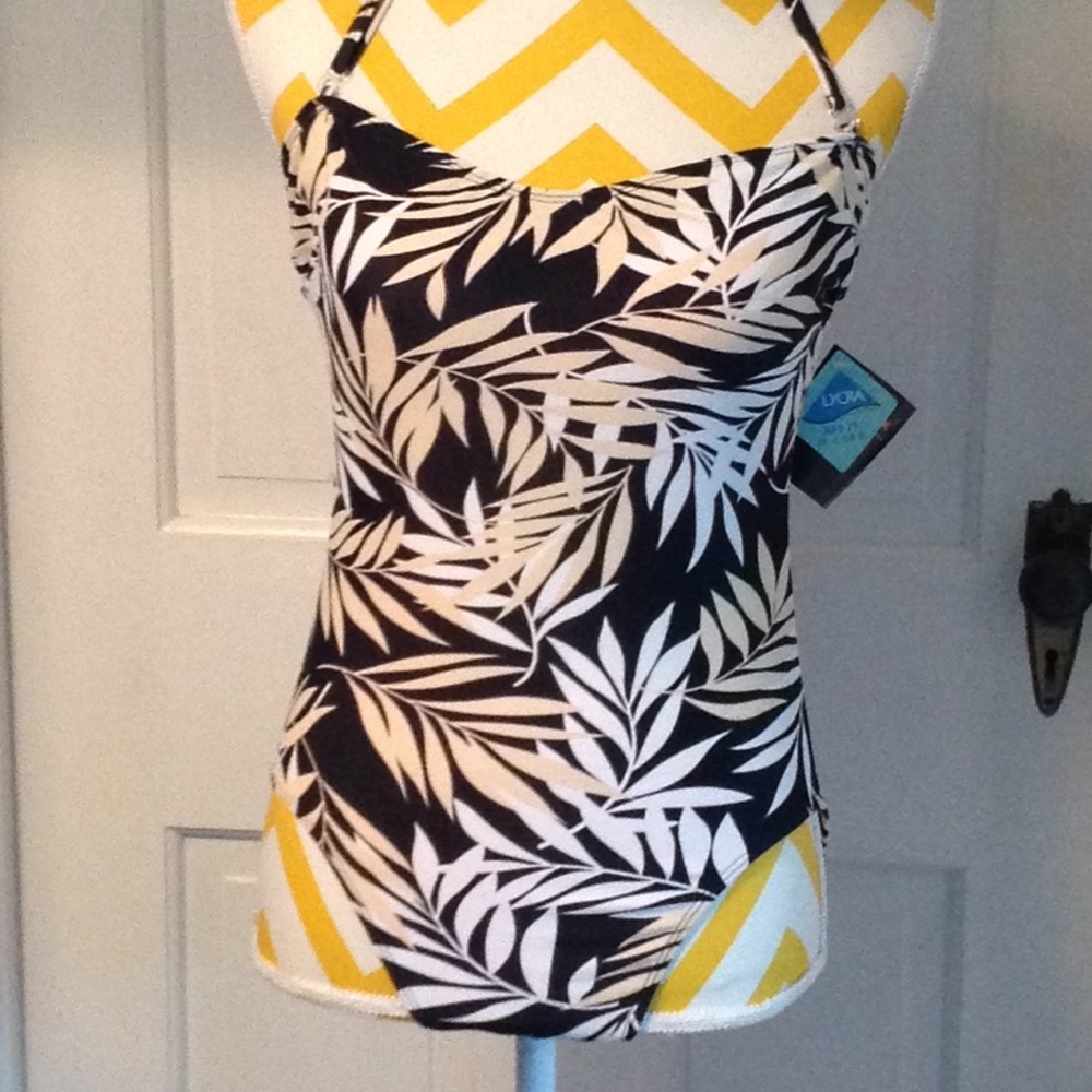 NWT One piece with matching cover all shirt.